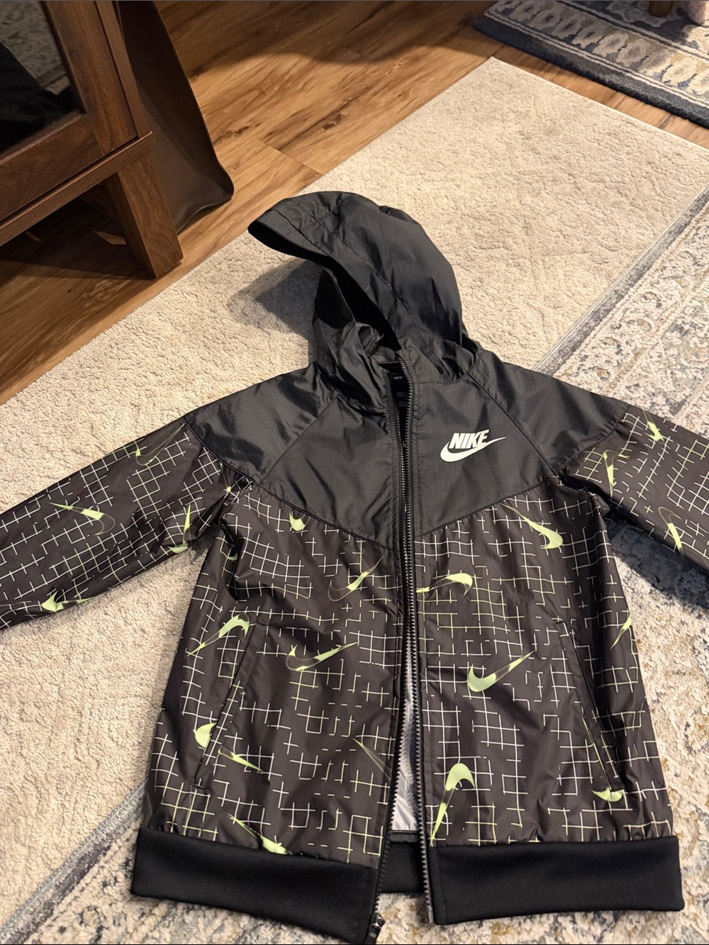 Nike Kids Black Jacket with glow in the darkNeon Green Swoosh Pattern